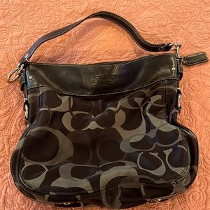Black Coach Purse with grey accents.
